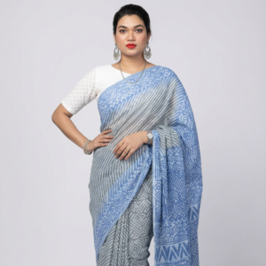 Model wearing an Abhrikaa Sky Blue Kota Saree with white geometric hand-block prints.